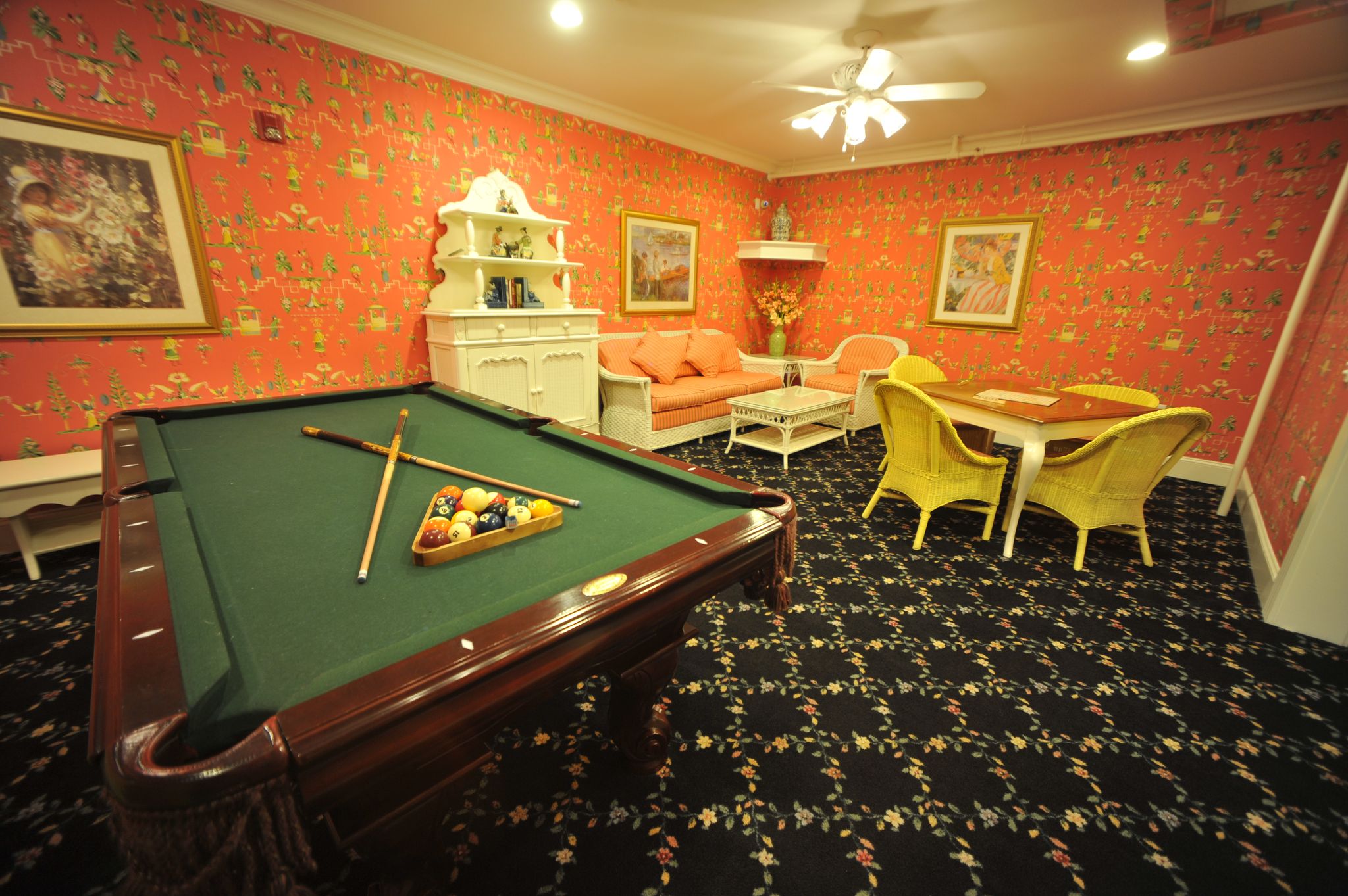 game room with pool table and card table in main street inn & suites